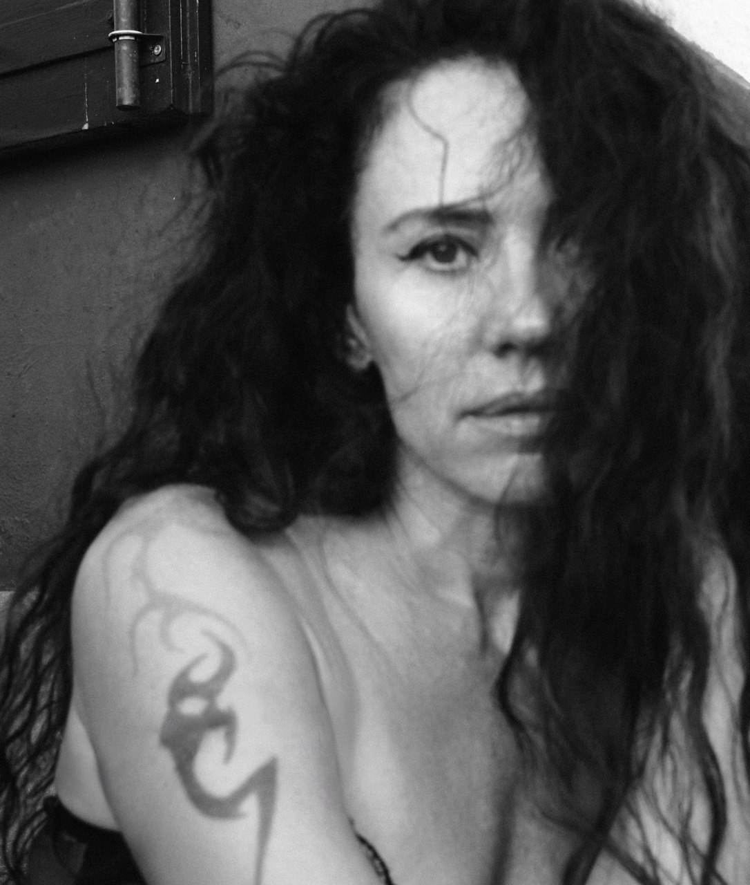 Portrait of the author in a cozy study with books